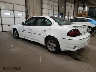 2001 Pontiac Grand Am GT1 with VIN 1G2NV52EX1C228458, listed as a Copart auction lot 76138094 with 118,833 mi miles and Clean Title. Bid and sale history available at carsss.com. Image 2.