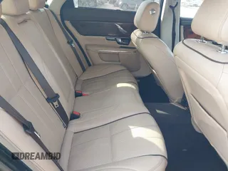 2013 Jaguar XJ Portfolio with VIN SAJWJ2GD2D8V44780, listed as a IAAI auction lot 41875069 with 87,806 mi miles and . Bid and sale history available at DreamBid. Image 8.