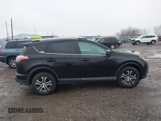2018 Toyota RAV4 LE with VIN 2T3BFREV2JW788700, listed as a IAAI auction lot 41986212 with 87,704 mi miles. Bid and sale history available at carsss.com. Image 12.
