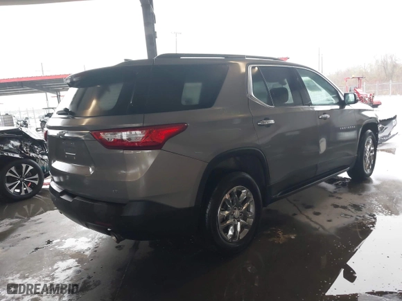 2019 Chevrolet Traverse LT Cloth with VIN 1GNEVGKW1KJ135509, listed as a IAAI auction lot 41283639 with 77,327 mi miles. Bid and sale history available at carsss.com. Image 4.