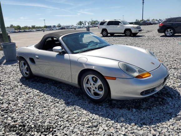 1998 Porsche Boxster z VIN WP0CA298XWU622217, wystawiony jako Copart lot #49441925 z przebiegiem 120 638 mil mil oraz Szkoda całkowita • Salvage title. Historia ofert i sprzedaży dostępna na DreamBid. Obrazek 4.