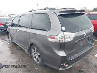 2014 Toyota Sienna SE with VIN 5TDXK3DC4ES434604, listed as a IAAI auction lot 41346434 with 108,633 mi miles and . Bid and sale history available at DreamBid. Image 3.