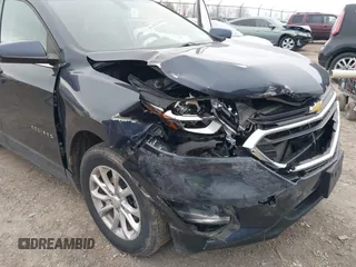 2018 Chevrolet Equinox LT with VIN 3GNAXJEV2JL293664, listed as a IAAI auction lot 41911923 with 105,057 mi miles and . Bid and sale history available at DreamBid. Image 6.