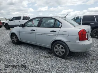 2009 Hyundai Accent Auto GLS z VIN KMHCN46C19U373167, wystawiony jako Copart lot #60026445 z przebiegiem 94 736 mil mil oraz Szkoda całkowita • Salvage title. Historia ofert i sprzedaży dostępna na DreamBid. Obrazek 2.
