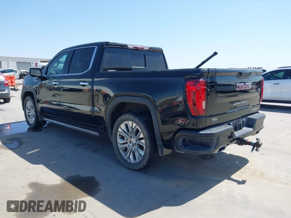 2020 GMC Sierra 1500 Denali with VIN 1GTU9FEL6LZ173499, listed as a IAAI auction lot 41856799 with 77,723 mi miles and . Bid and sale history available at DreamBid. Image 3.