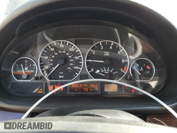 2005 BMW 3 Series 330xi with VIN WBAEW53455PN39175, listed as a Copart auction lot 75733054 with 165,015 mi miles and Salvage Title. Bid and sale history available at DreamBid. Image 9.