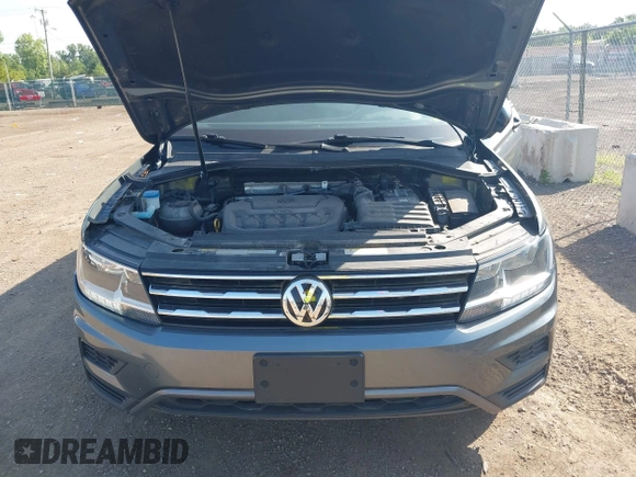 2021 Volkswagen Tiguan S with VIN 3VV0B7AX3MM038342, listed as a IAAI auction lot 42545665 with 66,809 mi miles and . Bid and sale history available at DreamBid. Image 10.
