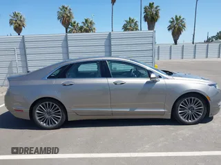 2016 Lincoln MKZ Hybrid with VIN 3LN6L2LU8GR613310, listed as a IAAI auction lot 41986892 with 114,087 mi miles. Bid and sale history available at carsss.com. Image 13.