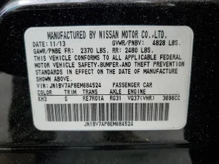 2014 Infiniti Q50 Premium with VIN JN1BV7AP8EM684524, listed as a Copart auction lot 59286115 with 105,107 mi miles and Salvage title. Bid and sale history available at DreamBid. Image 12.