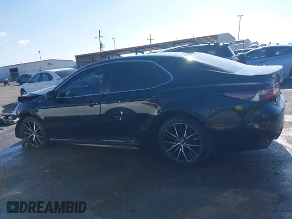 2021 Toyota Camry SE Nightshade with VIN 4T1G11AK5MU487725, listed as a IAAI auction lot 41196499 with 104,715 mi miles and . Bid and sale history available at DreamBid. Image 14.