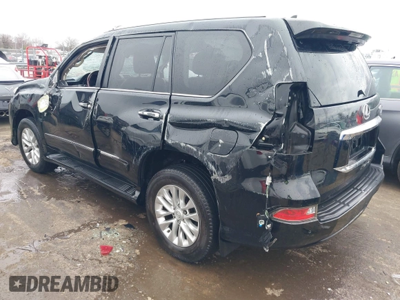 2014 Lexus GX 460 with VIN JTJBM7FX6E5073973, listed as a IAAI auction lot 41610332 with 128,870 mi miles. Bid and sale history available at carsss.com. Image 3.