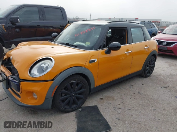 2016 MINI Hardtop 4 Door z VIN WMWXU1C56G2D10006, wystawiony jako IAAI lot #41752731 z przebiegiem 67 844 mil mil oraz . Historia ofert i sprzedaży dostępna na DreamBid. Obrazek 2.