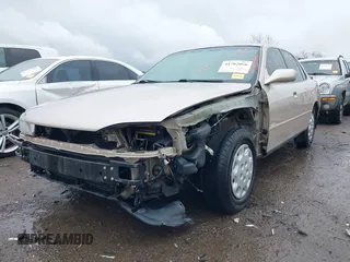 1996 Toyota Camry DX with VIN 4T1BG12K8TU738565, listed as a IAAI auction lot 41702096 with 100,587 mi miles. Bid and sale history available at carsss.com. Image 6.