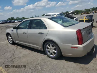 2009 Cadillac STS AWD z VIN 1G6DD67V390151523, wystawiony jako Copart lot #58758675 z przebiegiem Nie podano mil oraz Szkoda całkowita • Salvage title. Historia ofert i sprzedaży dostępna na DreamBid. Obrazek 2.
