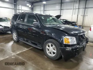 2004 GMC Envoy SLT with VIN 1GKDT13S642191868, listed as a Copart auction lot 82334304 with 150,810 mi miles and Salvage Title. Bid and sale history available at carsss.com. Image 4.