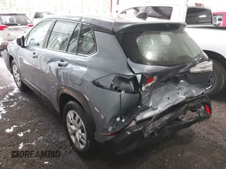 2022 Toyota Corolla Cross L with VIN 7MUAAAAG9NV034659, listed as a IAAI auction lot 42125356 with 14,631 mi miles and . Bid and sale history available at DreamBid. Image 3.