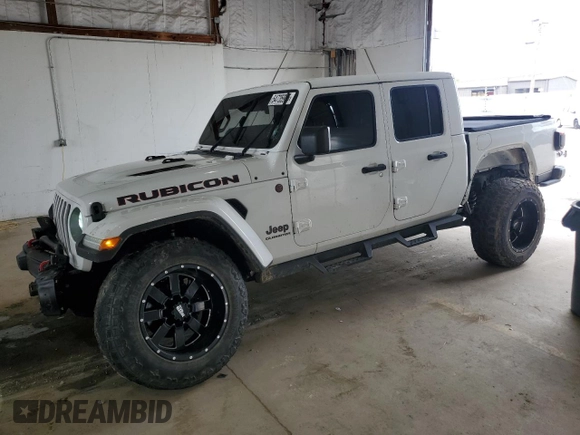 2020 Jeep Gladiator Rubicon z VIN 1C6JJTBG4LL102523, wystawiony jako Copart lot #54735955 z przebiegiem 104 579 mil mil oraz Szkoda całkowita • Salvage title. Historia ofert i sprzedaży dostępna na DreamBid. Obrazek 1.