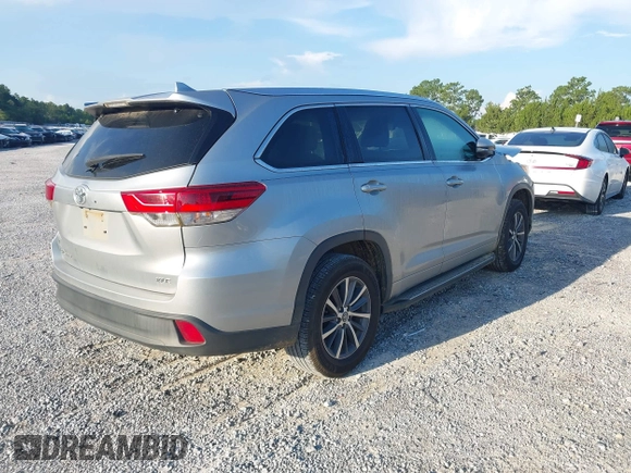2018 Toyota Highlander SE with VIN 5TDKZRFH7JS531369, listed as a IAAI auction lot 42671645 with 130,222 mi miles and . Bid and sale history available at DreamBid. Image 4.