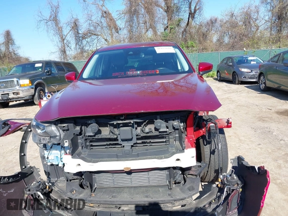 2020 Mazda CX-9 Touring z VIN JM3TCBCY6L0401324, wystawiony jako IAAI lot #41973626 z przebiegiem 53 891 mil mil oraz . Historia ofert i sprzedaży dostępna na DreamBid. Obrazek 13.