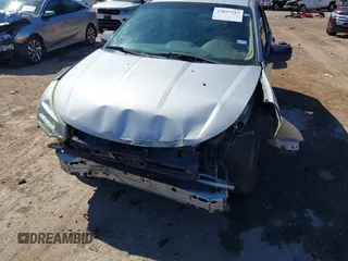 2008 Ford Focus SE z VIN 1FAHP35N18W162951, wystawiony jako IAAI lot #37857727 z przebiegiem 158 792 mil mil oraz . Historia ofert i sprzedaży dostępna na DreamBid. Obrazek 6.