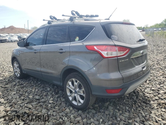 2013 Ford Escape SEL z VIN 1FMCU9HX6DUB05689, wystawiony jako Copart lot #55148765 z przebiegiem 69 178 mil mil oraz Czysty tytuł • Clean title. Historia ofert i sprzedaży dostępna na DreamBid. Obrazek 2.