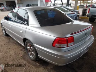 2001 Cadillac Catera z VIN W06VR54R51R058055, wystawiony jako IAAI lot #41574366 z przebiegiem 141 543 mil mil oraz . Historia ofert i sprzedaży dostępna na DreamBid. Obrazek 3.