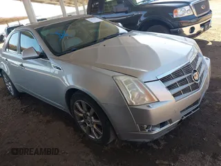 2008 Cadillac CTS AWD z VIN 1G6DP57V580112884, wystawiony jako IAAI lot #42273273 z przebiegiem 242 665 mil mil oraz . Historia ofert i sprzedaży dostępna na DreamBid. Obrazek 1.