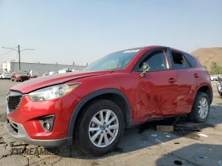 2014 Mazda CX-5 Touring with VIN JM3KE2CY0E0309845, listed as a Copart auction lot 62193734 with 97,878 mi miles and Salvage Title. Bid and sale history available at carsss.com. Image 1.