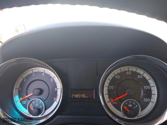 2015 Dodge Grand Caravan American Value Pkg with VIN 2C4RDGBG1FR748088, listed as a IAAI auction lot 42052160 with 248,540 mi miles. Bid and sale history available at carsss.com. Image 7.