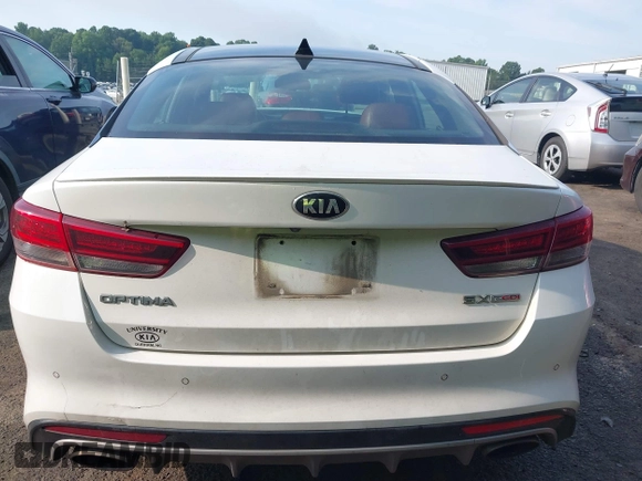 2017 Kia Optima SX z VIN 5XXGW4L26HG125516, wystawiony jako IAAI lot #42483007 z przebiegiem 152 400 mil mil oraz . Historia ofert i sprzedaży dostępna na DreamBid. Obrazek 16.
