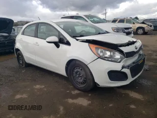 2014 Kia Rio LX with VIN KNADM5A34E6377346, listed as a Copart auction lot 82783993 with 107,160 mi miles and Salvage Title. Bid and sale history available at carsss.com. Image 4.