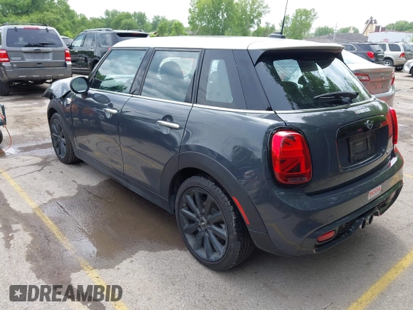 2019 MINI Hardtop 4 Door Cooper S z VIN WMWXU3C54K2H86856, wystawiony jako IAAI lot #42201474 z przebiegiem 56 610 mil mil oraz . Historia ofert i sprzedaży dostępna na DreamBid. Obrazek 3.