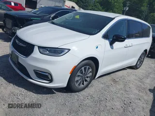2024 Chrysler Pacifica Hybrid Select z VIN 2C4RC1S72RR117788, wystawiony jako IAAI lot #42318543 z przebiegiem 21 855 mil mil oraz . Historia ofert i sprzedaży dostępna na DreamBid. Obrazek 2.