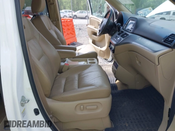 2010 Honda Odyssey Touring с VIN 5FNRL3H90AB039449, выставлен на аукционе IAAI как лот 42032203 с пробегом 128 265 миль миль и . История ставок и продаж доступна на DreamBid. Изображение 5.