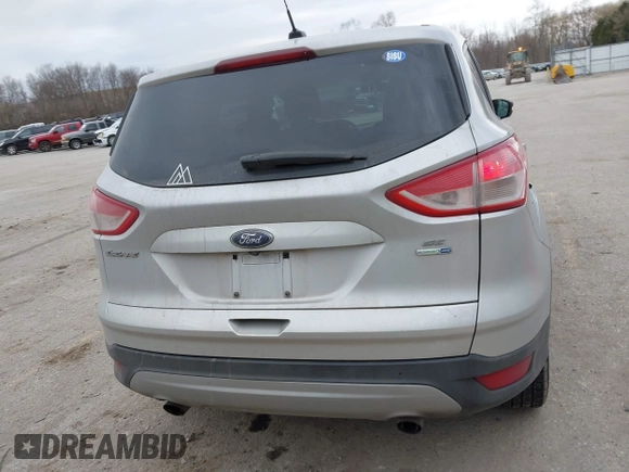 2014 Ford Escape SE with VIN 1FMCU9G9XEUD08119, listed as a IAAI auction lot 41828389 with 126,851 mi miles. Bid and sale history available at carsss.com. Image 16.