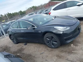 2018 Tesla Model 3 Long Range Battery z VIN 5YJ3E1EB3JF127410, wystawiony jako IAAI lot #41994858 z przebiegiem 100 494 mil mil oraz . Historia ofert i sprzedaży dostępna na DreamBid. Obrazek 13.