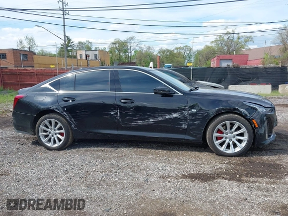 2021 Cadillac CT5 Luxury z VIN 1G6DX5RKXM0146235, wystawiony jako IAAI lot #42214676 z przebiegiem 72 847 mil mil oraz . Historia ofert i sprzedaży dostępna na DreamBid. Obrazek 13.