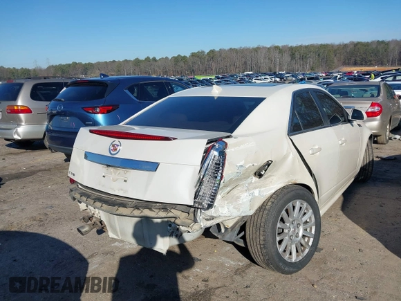 2011 Cadillac CTS Luxury z VIN 1G6DE5EY6B0118591, wystawiony jako IAAI lot #41486928 z przebiegiem 133 763 mil mil oraz . Historia ofert i sprzedaży dostępna na DreamBid. Obrazek 4.