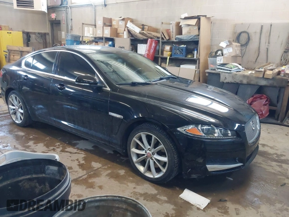 2015 Jaguar XF V6 Portfolio with VIN SAJWJ0FF5F8U57756, listed as a IAAI auction lot 41631278 with 47,158 mi miles. Bid and sale history available at carsss.com. Image 1.