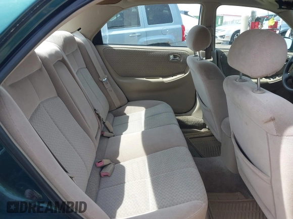 2001 Mazda 626 LX z VIN 1YVGF22D915241384, wystawiony jako IAAI lot #41927705 z przebiegiem 231 801 mil mil oraz . Historia ofert i sprzedaży dostępna na DreamBid. Obrazek 8.