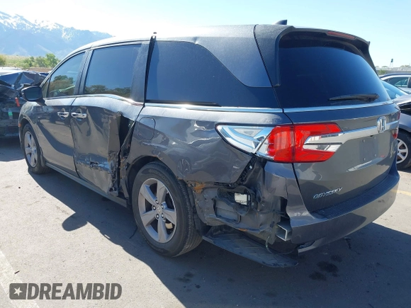 2018 Honda Odyssey EX-L z VIN 5FNRL6H7XJB067694, wystawiony jako IAAI lot #42177338 z przebiegiem 159 670 mil mil oraz . Historia ofert i sprzedaży dostępna na DreamBid. Obrazek 3.