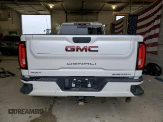 2020 GMC Sierra 3500HD Denali z VIN 1GT49WEY5LF265507, wystawiony jako Copart lot #53607974 z przebiegiem 62 955 mil mil oraz Szkody całkowita. Historia ofert i sprzedaży dostępna na DreamBid. Obrazek 6.