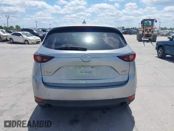 2017 Mazda CX-5 Sport with VIN JM3KFABLXH0135560, listed as a IAAI auction lot 42062016 with 153,416 mi miles. Bid and sale history available at carsss.com. Image 17.