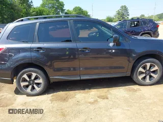 2018 Subaru Forester z VIN JF2SJABC9JH457297, wystawiony jako IAAI lot #42052293 z przebiegiem 94 058 mil mil oraz . Historia ofert i sprzedaży dostępna na DreamBid. Obrazek 13.