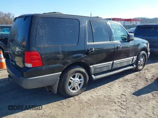 2004 Ford Expedition XLT with VIN 1FMPU16WX4LB12891, listed as a IAAI auction lot 41695636 with 209,574 mi miles. Bid and sale history available at carsss.com. Image 4.