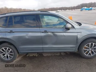 2021 Volkswagen Tiguan S with VIN 3VV1B7AX8MM016874, listed as a IAAI auction lot 41633090 with 76,857 mi miles and . Bid and sale history available at DreamBid. Image 13.