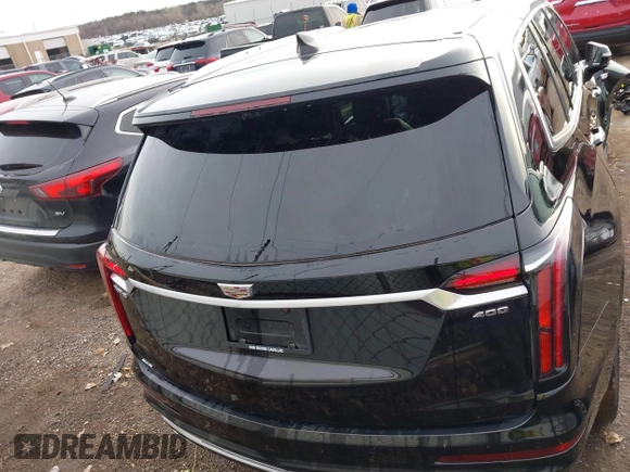 2021 Cadillac XT6 Premium Luxury z VIN 1GYKPDRS9MZ120150, wystawiony jako IAAI lot #41715368 z przebiegiem 47 835 mil mil oraz . Historia ofert i sprzedaży dostępna na DreamBid. Obrazek 17.