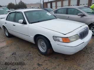 2001 Mercury Grand Marquis LS with VIN 2MEFM75W41X672360, listed as a IAAI auction lot 41418594 with 73,717 mi miles and . Bid and sale history available at DreamBid. Image 1.