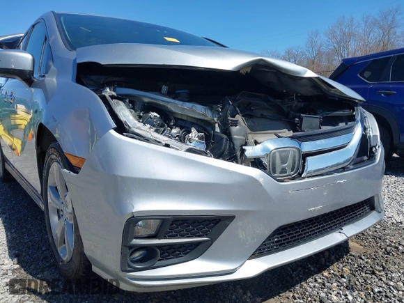 2018 Honda Odyssey EX-L with VIN 5FNRL6H75JB092633, listed as a IAAI auction lot 41971589 with 103,099 mi miles and . Bid and sale history available at DreamBid. Image 6.