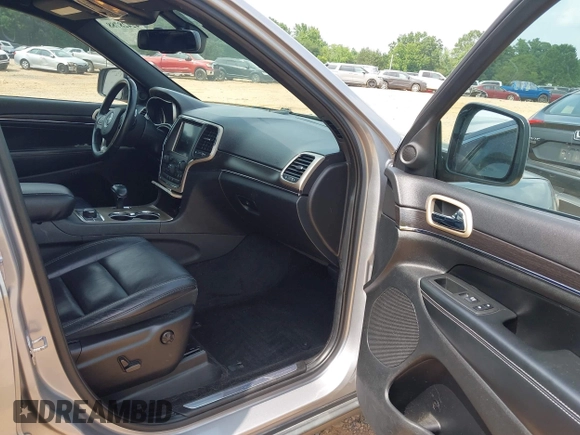2014 Jeep Grand Cherokee Limited with VIN 1C4RJFBG9EC210507, listed as a IAAI auction lot 42428788 with 141,147 mi miles and . Bid and sale history available at DreamBid. Image 5.
